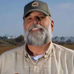 Paul C. Messina headshot at the Tijuana Estuary