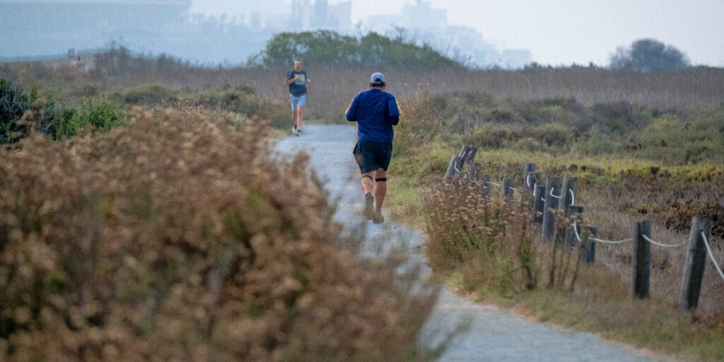 Joggers on the trail at the Tijuana River National Estuarine Research Reserve